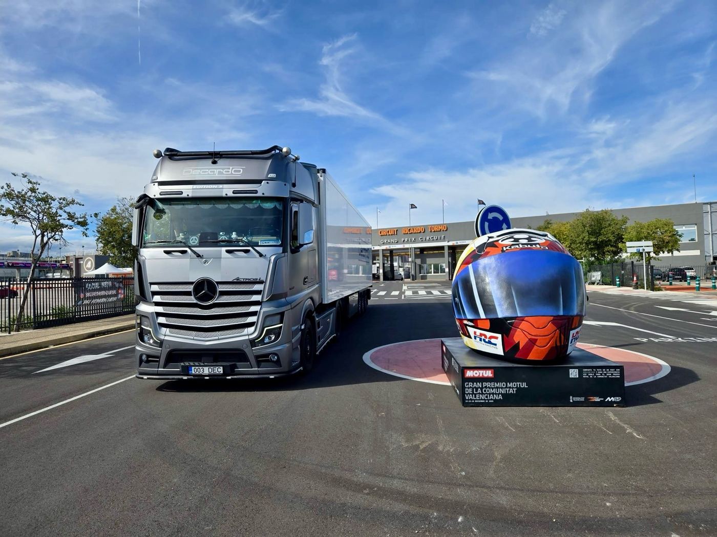 Decardo tractor unit with a semi-trailer in front of the Valencia racetrack entrance
